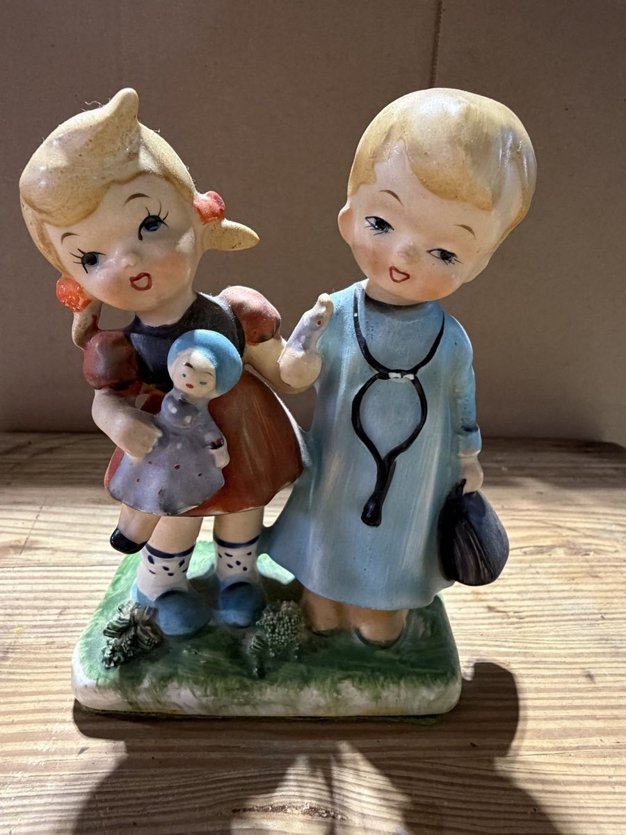 Bisque Boy and Girl Playing Doctor Figurine