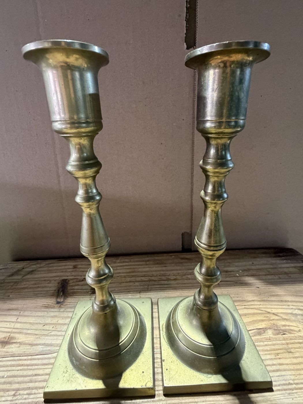 Pair of brass candlesticks with square bases